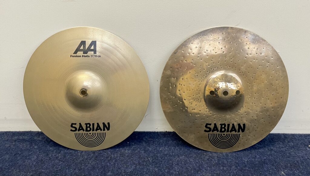 Pair of Sabian AAX 13" Fusion Hi Hat cymbals, with surface finger prints and no signs of wear.